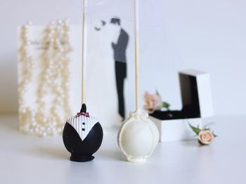 Close-up of decorations hanging on table