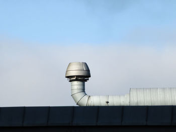 Low angle view of chimney against clear sky