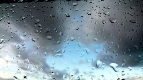 Close-up of water drops on glass