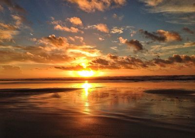 Scenic view of sea at sunset