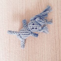 Directly above shot of knitted teddy bear on table