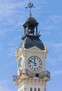 Low angle view of clock tower against sky