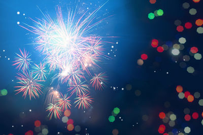 Firework display at night
