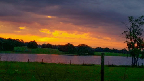 Scenic view of landscape at sunset