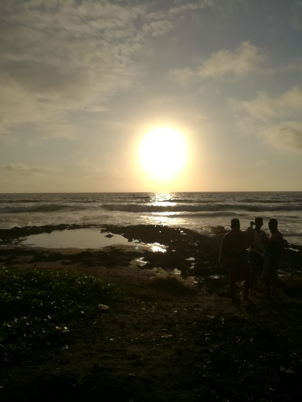 PEOPLE AT BEACH DURING SUNSET