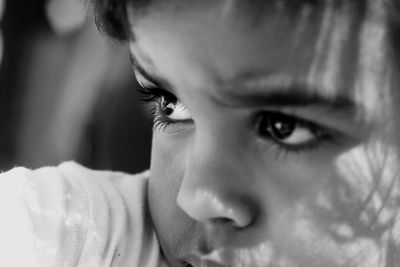 Close-up portrait of man looking away