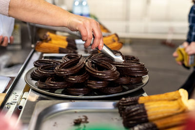 Midsection of person preparing food