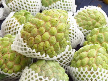 Close-up of custard apple fruits for sale in market