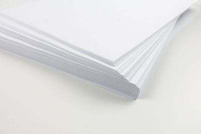 High angle view of book against white background