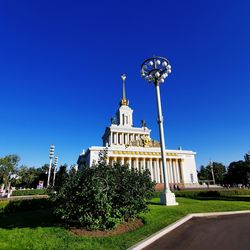 Low angle view of building against blue sky