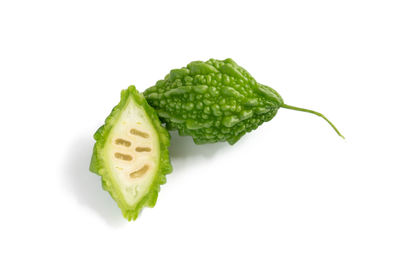 Close-up of strawberry over white background