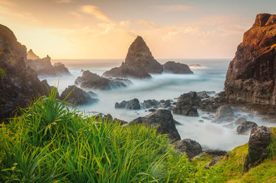 Scenic view of sea against sky during sunset