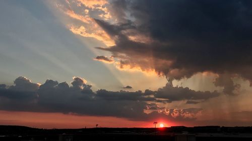 Scenic view of dramatic sky during sunset