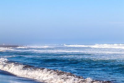 Scenic view of sea against clear sky