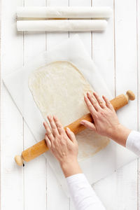 High angle view of person preparing food on table