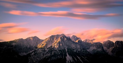 Scenic view of mountains against sky during sunset