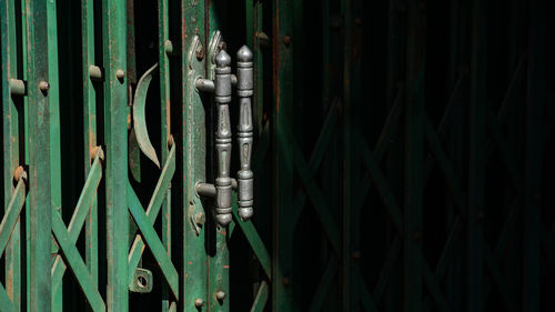 Full frame shot of closed metal gate