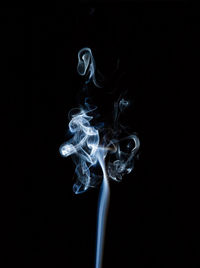 Close-up of fire against black background