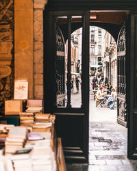 Open door of building in city