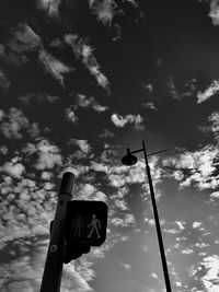 Low angle view of street light against sky