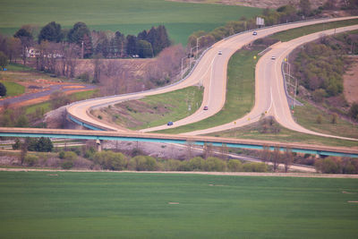 High angle view of road amidst field