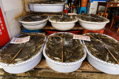 Various vegetables for sale at market stall