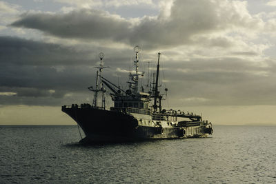 Ship in sea against sky