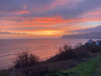 Scenic view of sea against sky during sunset