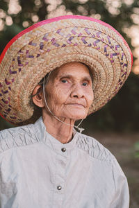 Portrait of woman wearing hat