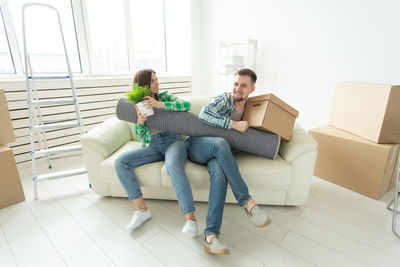 People sitting on sofa