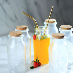 Close-up of drink in jars on table