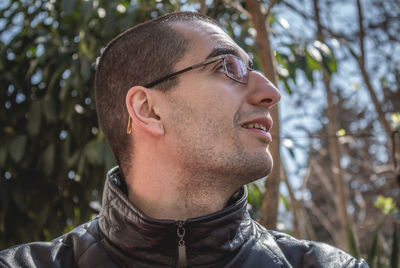 Portrait of young man looking away