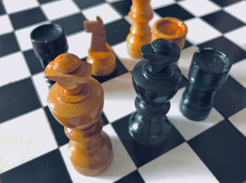 High angle view of chess pieces on table