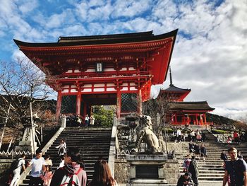 Group of people in temple against building