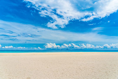 Paradise island, white beach and blue sky at koh pai, krabi, thailand.