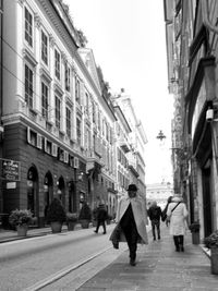 People walking on city street