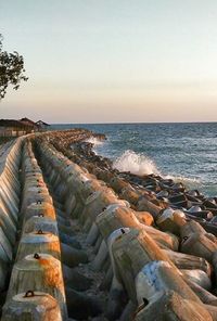 Scenic view of sea against sky at sunset