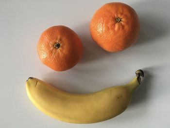 High angle view of apple against white background