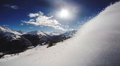 Scenic view of snow covered mountains