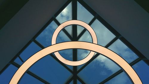 Low angle view of illuminated building against sky