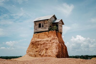 Built structure against cloudy sky