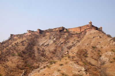 Low angle view of fort against sky