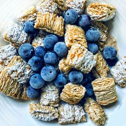 High angle view of fruits in plate on table