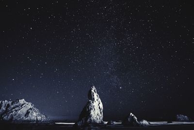 Scenic view of star field against sky at night