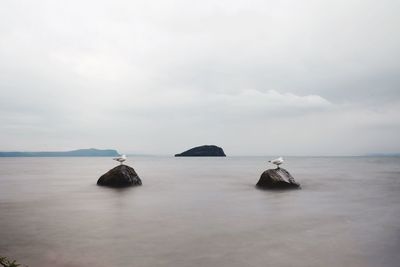 View of calm sea against sky