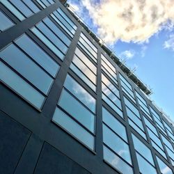 Low angle view of modern building against sky