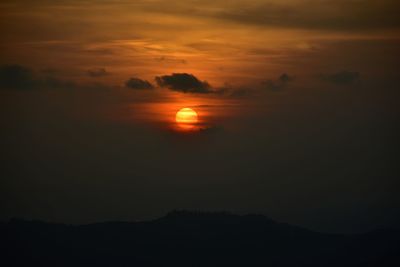 Scenic view of silhouette landscape against romantic sky at sunset