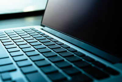 Close-up of laptop on table