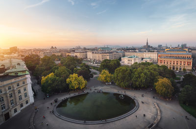 High angle view of cityscape against sky during sunset