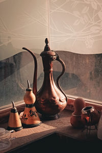 Close-up of kettle on table